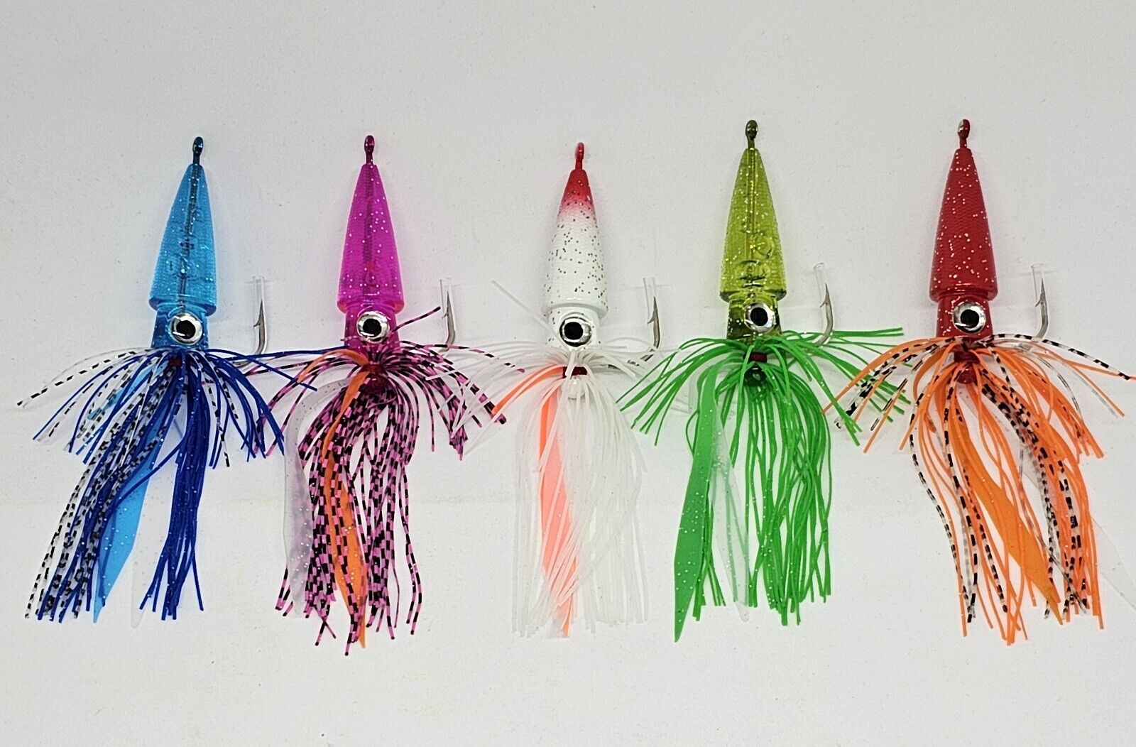 Is it silly to put these squid trailers on my rockfish jigs? Yarn inside to  hold scent gel. : r/Fishing